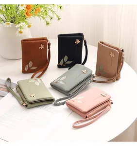 Floral printed women's short wallets in assorted colors with wrist straps
