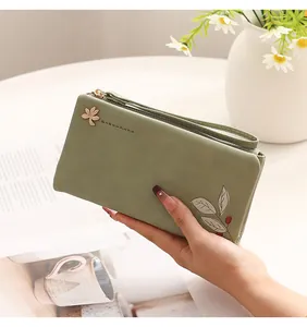 Elegant green PU leather long wallet with leaf print and wristlet strap for women