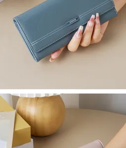 Blue pebbled leather long wallet for women with elegant stitching and snap closure