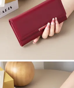 Elegant burgundy faux leather long wallet for women with gold-tone metal accent