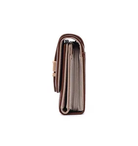 Side view of women's leather wallet showing multi-layered structure and zipper
