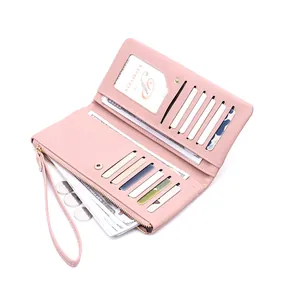 Detailed view of pink long wallet interior with multi-card slots and cash compartments
