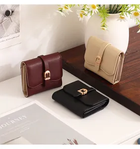 Compact women's belt buckle wallets in black, beige and burgundy leather textures