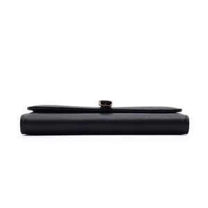 Side view of a black pebbled leather long wallet showing thickness and metal clasp.