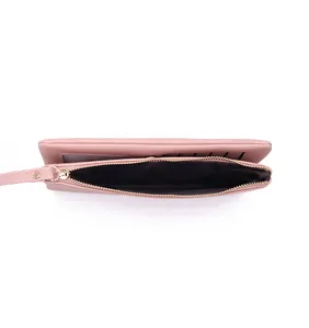 Detailed interior view of pink long PU leather wallet with card slots and zipper.