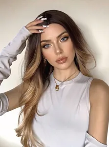 Detailed view of a stylish long wavy ombré blonde wig with a middle part design