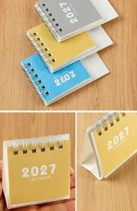 Close-up detail of 2027 mini desk calendar featuring durable double-loop wire binding