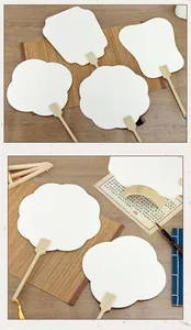 Macro detail of ancient style DIY blank fans with bamboo handles in various shapes