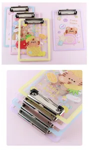 Close-up detail of cute cartoon tiger acrylic clipboards in various pastel colors