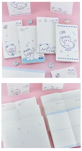 Detailed view of cute bear notebooks with illustrated covers and various inner page layouts.