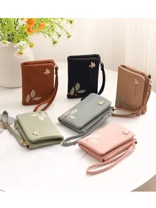 Floral short wallets for women with leaf pattern and wrist strap in various colors