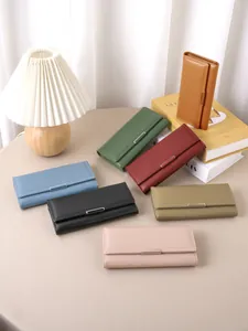Elegant minimalist long wallets for women in multiple colors with metal buckle trim