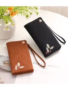 Elegant long PU leather wallets featuring stylish leaf prints and a gold flower charm