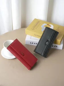 Elegant pebbled leather long wallets for women with snap closure and multi-card slots