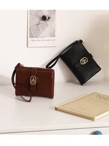 Cartera corta para mujer con diseño craquelado y hebilla de hoja dorada con muñequera