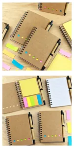 Detail of eco-friendly kraft paper spiral notebook with colorful sticky notes and pen