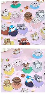 Detailed view of various cute cartoon animal heart-shaped sticky notes in vibrant colors.