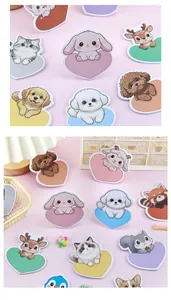 Close-up of various cute heart-shaped animal sticky notes for school and office use