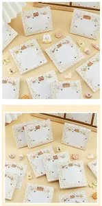 Macro shot of cute capybara and bear themed sticky note pads with kawaii decorations