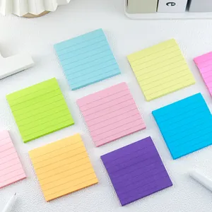 Brightly colored square sticky notes with horizontal lines for office and student organization