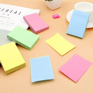 Multi-color square sticky notes in pink green yellow and blue for office
