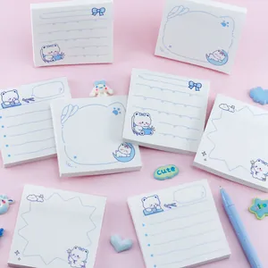 Set of cute cartoon bear sticky notes with various blue and white floral designs