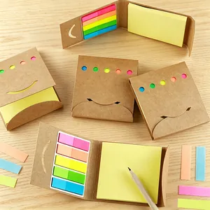 Professional colorful sticky note set in kraft paper folder with smile cut-out on wooden desk
