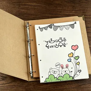 Kreatives DIY-Fotoalbum aus Kraftpapier mit niedlich illustrierten Innenseiten