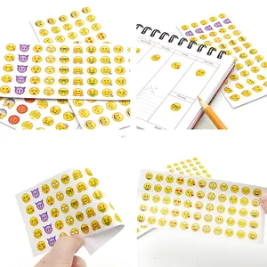 Set of 660 mini emoji stickers on 12 sheets for DIY scrapbooking and journals.