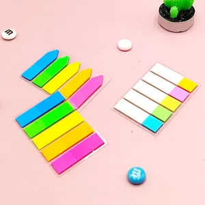 Colorful transparent fluorescent index tabs and arrow sticky notes for book marking