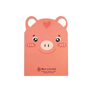 Cute pink cartoon pig-shaped pocket notebook for students' daily notes and memos.