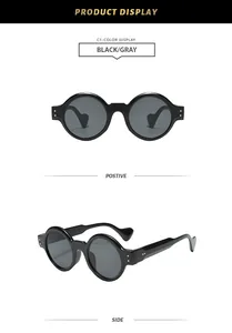 Vue détaillée des lunettes de soleil rondes steampunk noires à monture épaisse et verres gris