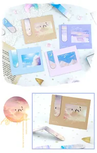 Close-up of starry sky oil painting magnetic bookmarks with elegant backing cards.