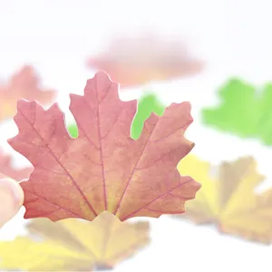 Realistic maple leaf shaped decorative sticky notes in autumn colors for journaling and decor