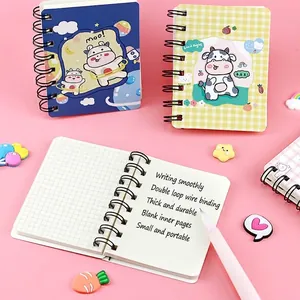 Cute cartoon cow mini spiral notebook for portable journaling and daily sketches