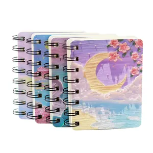 A7 mini oil painting coil notebooks with dreamy moon and floral starry sky designs.