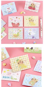 Detalle de lindas tarjetas de felicitación con motivos de conejo y tigre en colores pastel