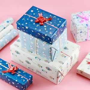Assorted cartoon gift wrapping paper featuring star cat and fish patterns for DIY boxes