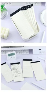 Portable slim minimalist to-do list notepad for daily task planning and journaling