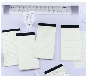 Detail view of slim vertical memo pads with grid, lined, and to-do list formats.