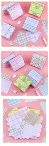 Gedetailleerd overzicht van raster-memoblokjes in transparante doosjes met pastel labels