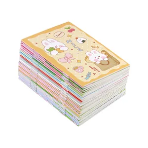 A stack of colorful portable cartoon mini notebooks featuring cute bunny and carrot illustrations
