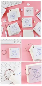 Detail view showing the silver metal ring and cartoon bear prints on a pink background.