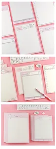 Close-up detail of cute pink bear B5 memo pads with functional grid and line layouts
