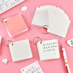 Portable blank wordbook with iridescent cover and metal binder rings