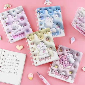 Adorably cute 3D relief bunny spiral notebook for school kids with daily planner pages