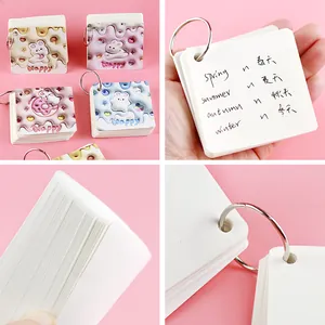 Portable mini spiral pocket notebook featuring a 3D cute rabbit cover design on pink background