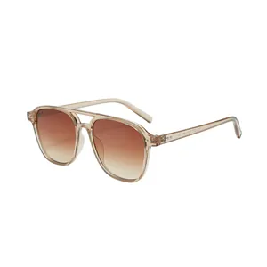 Retro-Piloten-Sonnenbrille mit champagnerfarbenem Rahmen und Doppelsteg.