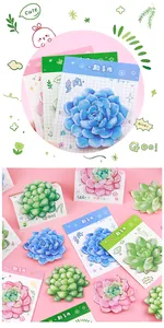 Detailed view of succulent-shaped sticky notes in various colors on grid backing cards