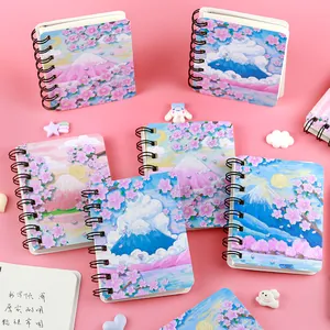 Kleine Spiralnotizbücher mit Fuji Dream Kirschblüten-Illustration auf rosa Hintergrund